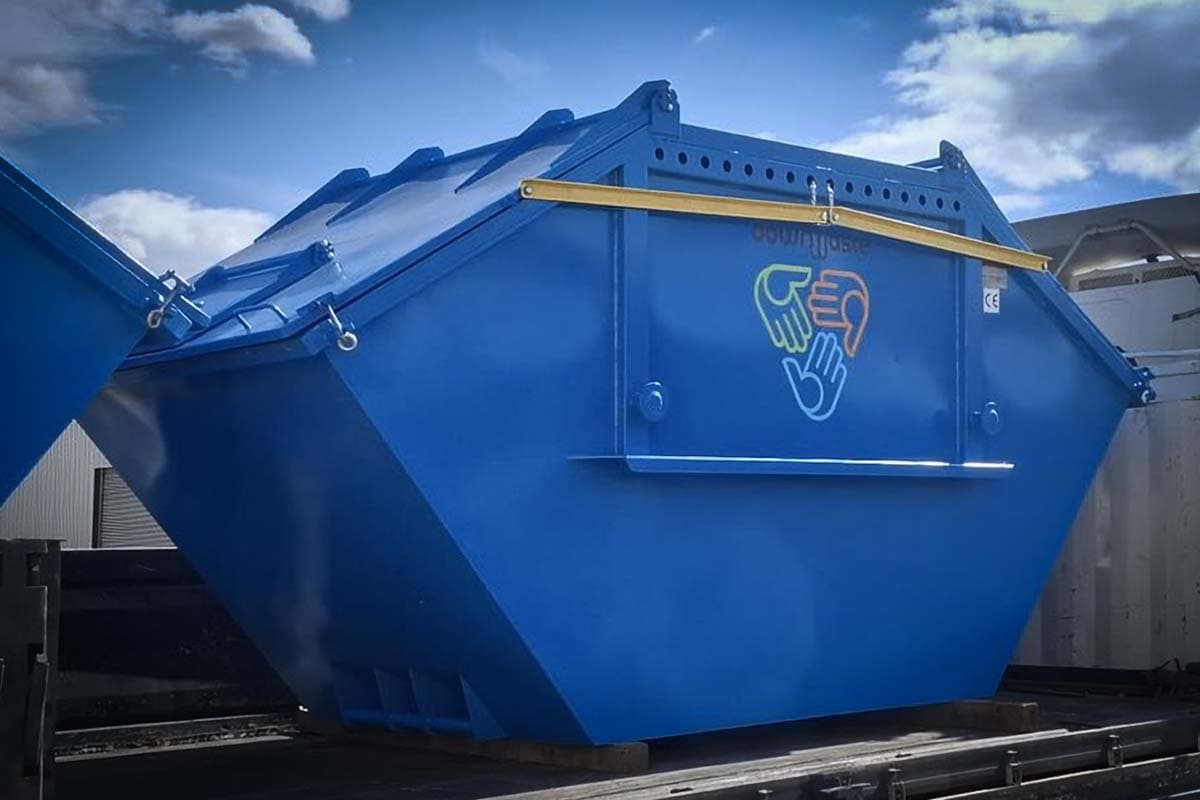 Downwaste skip container on site